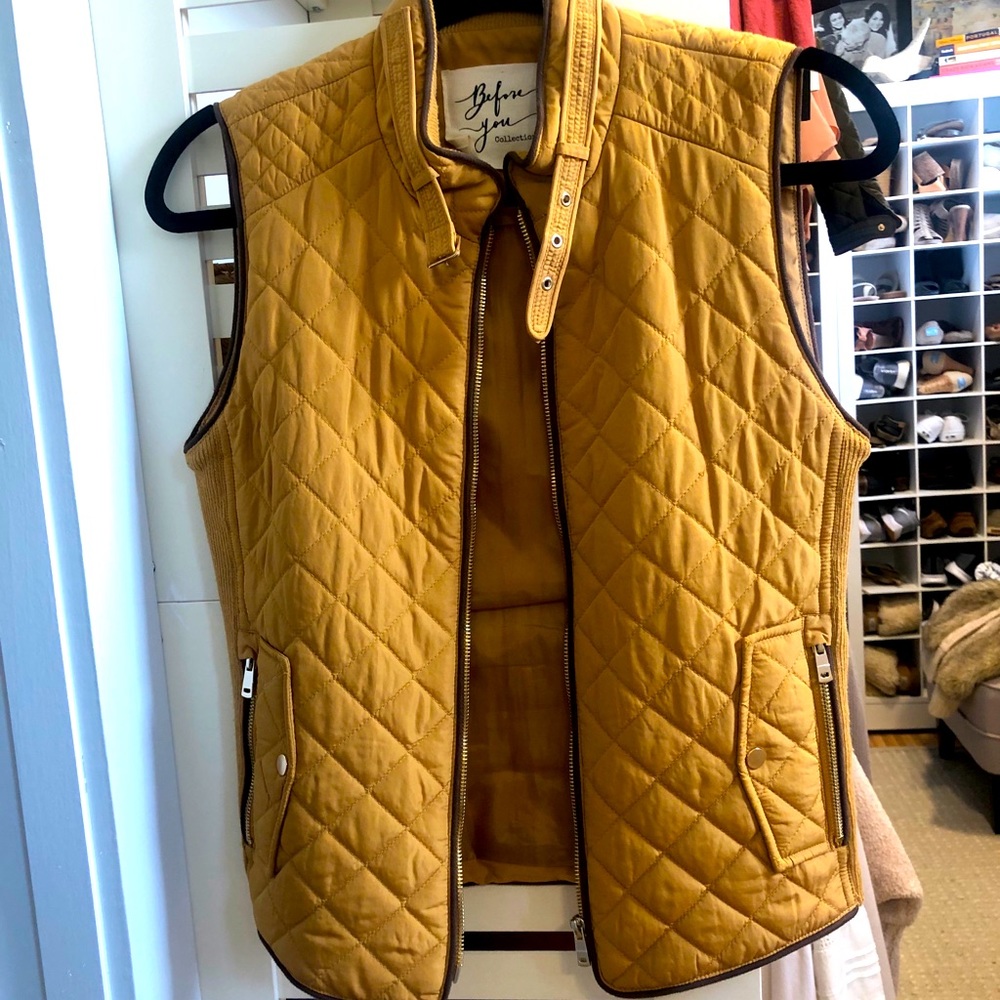 Mustard colored quilted vest with gold details
